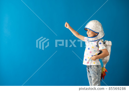 Happy child playing toy rocket 85569286