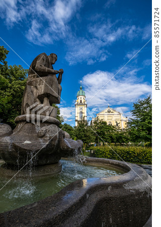 Fountain in front of St. Joseph, a Roman Catholic church located in Maxvorstadt, Munich, Germany. Fountain in front of St. Joseph, a Roman Catholic church located in Maxvorstadt, Munich, Germany. 85571724