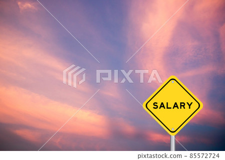 Yellow transportation sign with word salary on violet sky background Yellow transportation sign with word salary on violet sky background 85572724