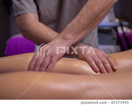 relaxing pain. fabulous full foot massage.close up side view cropped photo. 85573445