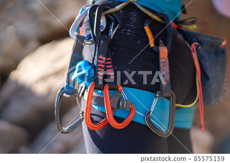 Man is climbing, hiking in the mountains. Man is climbing, hiking in the mountains. 85575159