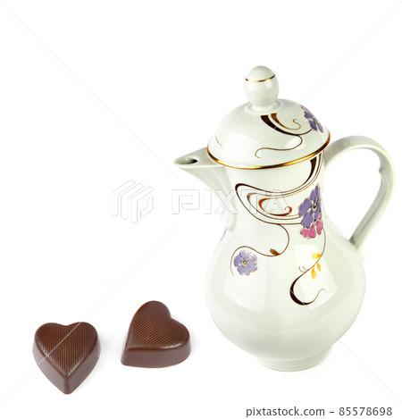 Vintage porcelain teapot isolated on white . Free space for text. 85578698
