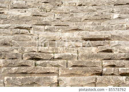 old stone steps - tribunes of an antique theater old stone steps - tribunes of an antique theater 85578762