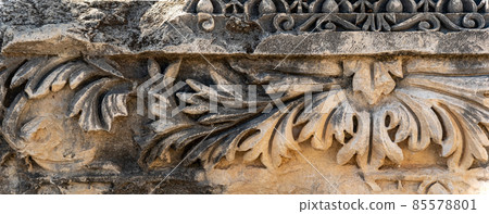 ancient weathered relief on the ruins of a building in the ancient city of Myra, Turkey 85578801