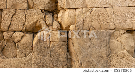 ancient wall texture of cracked stone blocks 85578806