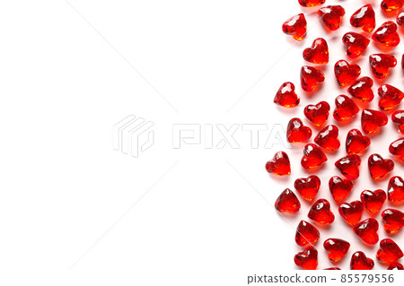 Full Frame Image of Sparkling Red Gemstone Hearts on a White Studio Background 85579556