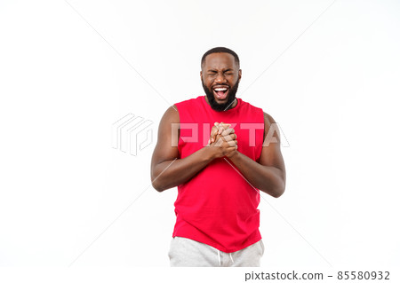 Young fitness african black man in sport wear cheering carefree and excited. Victory concept. 85580932