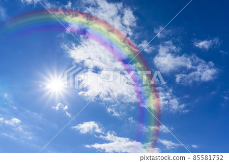 Bright blue sky with rainbow and sunshine_02 85581752