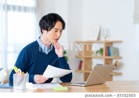 Young man having a video conference on telework 85582803