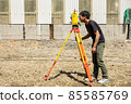Land and house surveyor doing survey 85585769