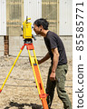 Land and house surveyor doing survey 85585771