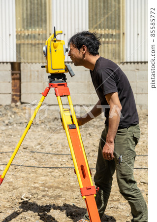Land and house surveyor doing survey Land and house surveyor doing survey 85585772