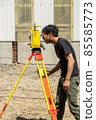 Land and house surveyor doing survey 85585773