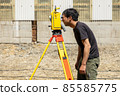Land and house surveyor doing survey 85585775