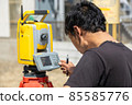 Land and house surveyor doing survey 85585776