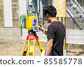 Land and house surveyor doing survey 85585778