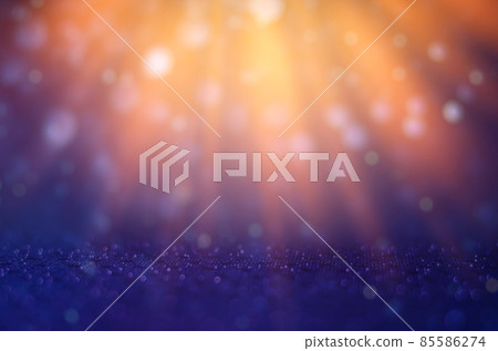 The background is blue, orange and light shines down to celebrate. The background is blue, orange and light shines down to celebrate. 85586274