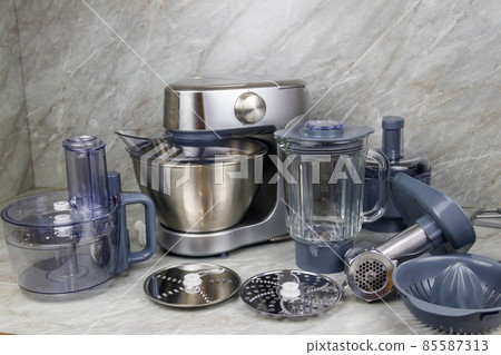 Modern kitchen machine with different attachments and accessories 85587313