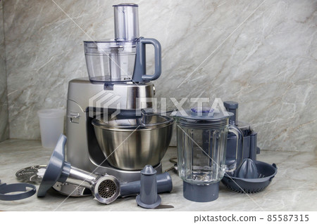 Modern kitchen machine with different attachments and accessories Modern kitchen machine with different attachments and accessories 85587315