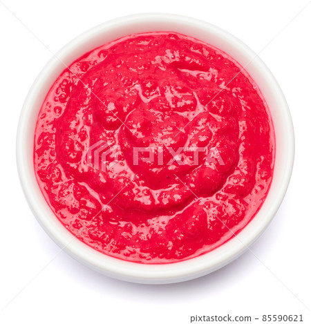 Horseradish red sauce in ceramic bowl isolated on white Horseradish red sauce in ceramic bowl isolated on white 85590621