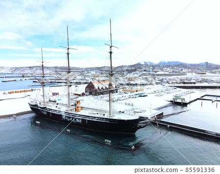 Aerial view of Esashiko Marina and Kaiyomaru in Esashi-cho, Hokkaido in winter Aerial view of Esashiko Marina and Kaiyomaru in Esashi-cho, Hokkaido in winter 85591336