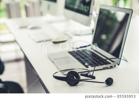Headset and customer support equipment at call center ready for actively service Headset and customer support equipment at call center ready for actively service 85593953