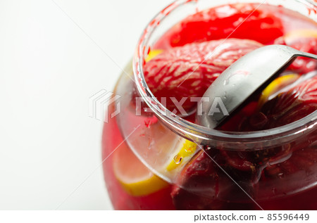 Punch prepared for Halloween party with decorative elements stylized as human organs 85596449