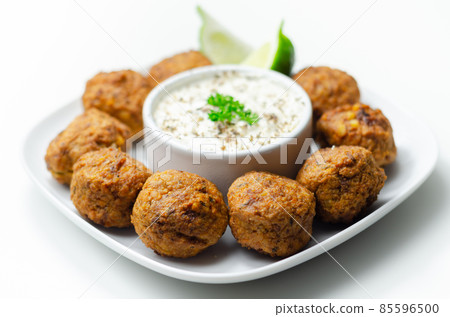 Falafels, gently spiced blend of sweet potato, chickpeas and onion with a sour dip Falafels, gently spiced blend of sweet potato, chickpeas and onion with a sour dip 85596500