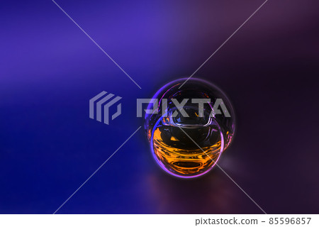 Expensive single malt whisky in a tasting glass on the unique background 85596857