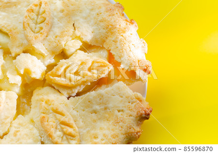 Traditional apple pie, Bramley apple filling in shortcrust pastry, topped with demerara sugar glaze 85596870