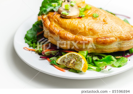 Steak and ale pasty, British steak with ale, potato and leek, wrapped in puff pastry 85596894