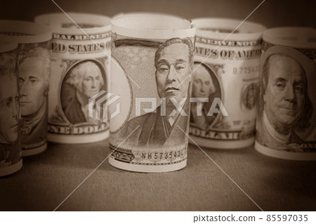 10,000 yen bill and dollar bill 10,000 yen bill and dollar bill 85597035