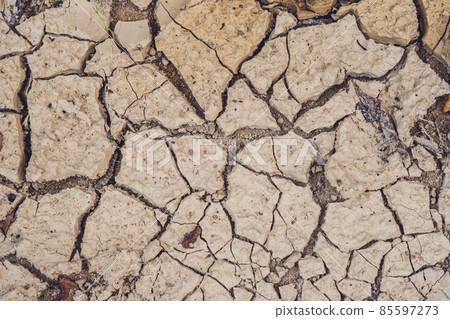 dry cracked earth. The desert. Background. It's hot, the global shortage of water on the planet dry cracked earth. The desert. Background. It's hot, the global shortage of water on the planet 85597273