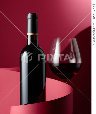 Bottle of red wine. 85597331