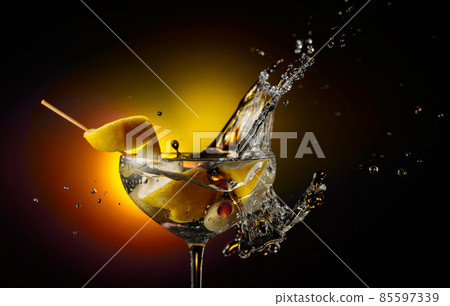 Martini with green olives. 85597339