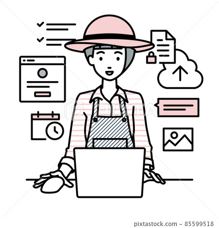 一位農婦坐在辦公桌前，在 PC 上做網上商店或營銷工作 85599518