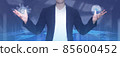 Businessman hand holding global network connection of metaverse digital cyber world, Innovation, The real world with icons innovation technology future. 85600452