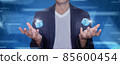 Businessman hand hold electronic innovation blockchain technology token money bank bitcoin, metaverse and crypto digital. 85600454