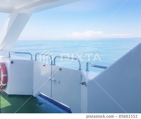 A lifebuoy on the deck of a luxury yacht, a view of the sea with waves, a trail on the water, the concept of a vacation on the water and a romantic trip A lifebuoy on the deck of a luxury yacht, a view of the sea with waves, a trail on the water, the concept of a vacation on the water and a romantic trip 85601552