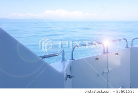 Close-up of the ship's side, the view from the deck of the yacht at dawn on the sea, calm and serenity Close-up of the ship's side, the view from the deck of the yacht at dawn on the sea, calm and serenity 85601555