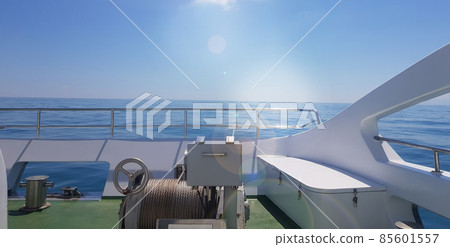 View of the calm sea from the deck of a luxury yacht, the concept of relaxing on the water and a romantic trip View of the calm sea from the deck of a luxury yacht, the concept of relaxing on the water and a romantic trip 85601557