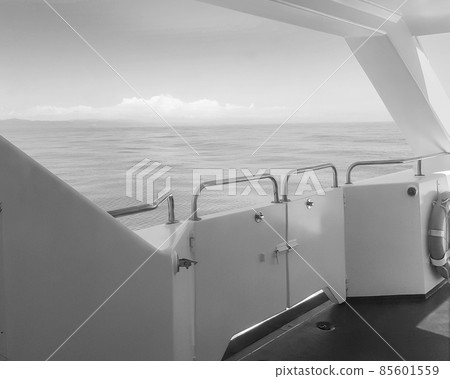 Close-up of the ship's side, the view from the deck of the yacht at dawn on the sea, calm and serenity Close-up of the ship's side, the view from the deck of the yacht at dawn on the sea, calm and serenity 85601559