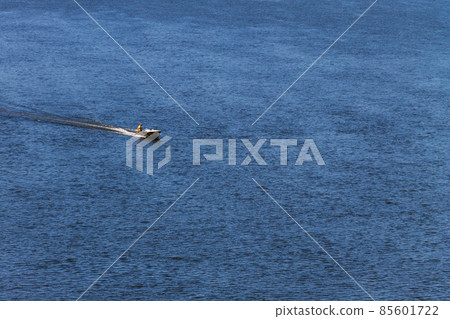 Boat with fishermen at the river Dnieper, Ukraine Boat with fishermen at the river Dnieper, Ukraine 85601722