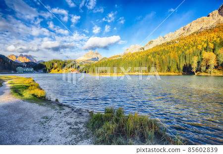 Astonishing view of popular travel destination mountain lake Antorno in autumn. 85602839