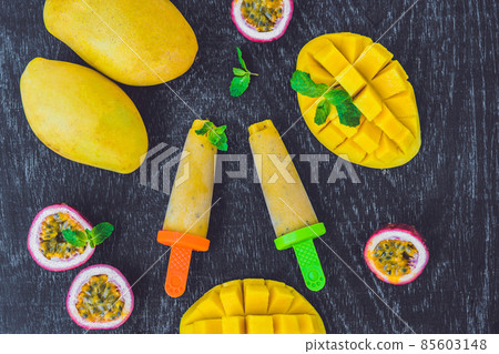 Homemade ice cream from mango and passion fruit. Popsicle Homemade ice cream from mango and passion fruit. Popsicle 85603148