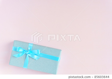 Blue glitter wrapping gift pink background 85603644