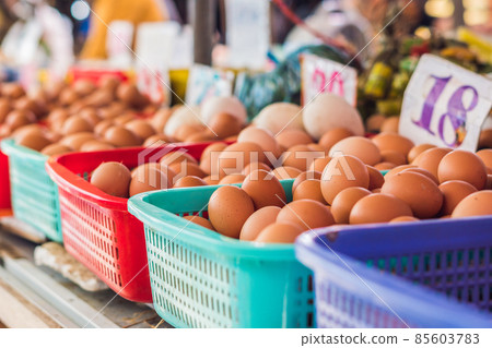 The eggs - chicken and quail in the wicker basket on the Vietnamese market. Asian food concept 85603783