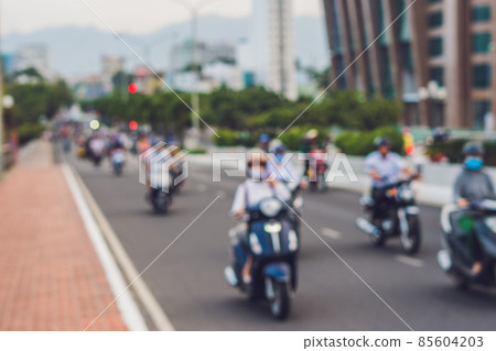 Blurred picture of motorcycles on the road 85604203