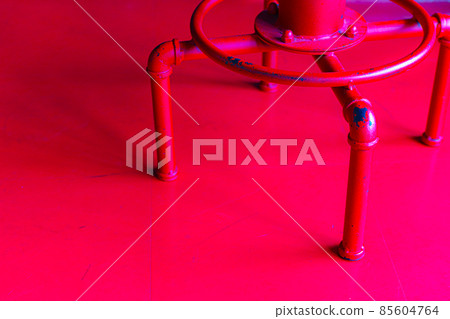Up of the bright red pipe foot chair Up of the bright red pipe foot chair 85604764