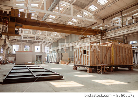 House under construction with prefabricated containers and cabins House under construction with prefabricated containers and cabins 85605172